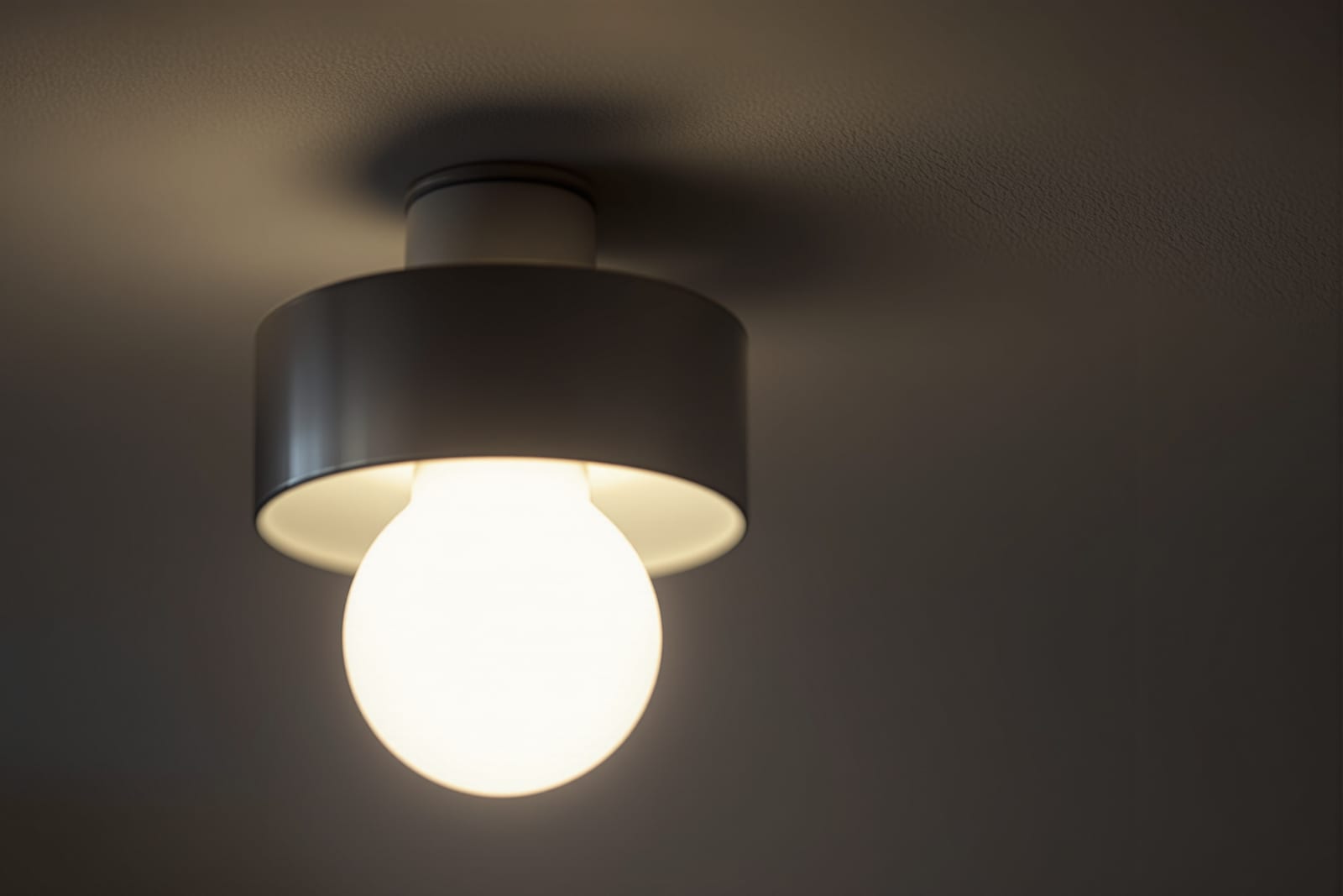 Close up of energy efficient LED light bulb glowing warmly